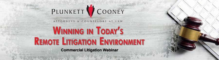 gavel with keyboard on marble table top Winning Remote Litigation Webinar